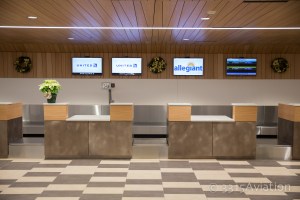 United and Allegiant ticket counters.